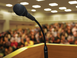 image of a microphone on a podium
