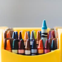 image of a crayon pack with one crayon higher than the others